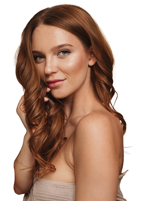 portrait of a woman with long wavy red hair smiling softly with natural makeup emphasizing her features and healthy skin showcasing the beauty and elegance of three distinct styles